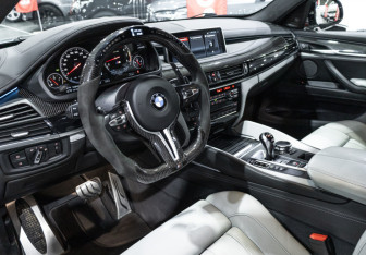 Подержанный автомобиль BMW X6 M 2017 года (17 фото)