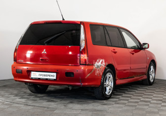 Подержанный автомобиль Mitsubishi Lancer Wagon 2004 года (5 фото)