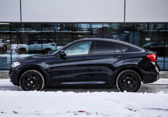 Подержанный автомобиль BMW X6 2017 года (8 фото)