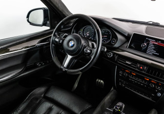 Подержанный автомобиль BMW X5 2016 года (16 фото)