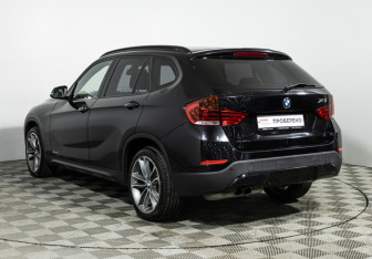 Подержанный автомобиль BMW X1 2013 года (7 фото)