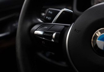 Подержанный автомобиль BMW X6 2016 года (13 фото)