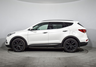 Подержанный автомобиль Hyundai Santa Fe 2015 года (8 фото)