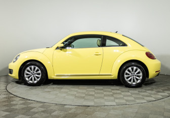 Подержанный автомобиль Volkswagen Beetle Hatchback 2014 года (8 фото)