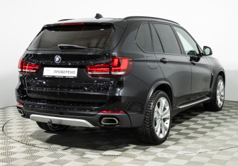 Подержанный автомобиль BMW X5 2015 года (5 фото)