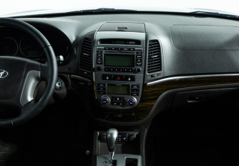 Подержанный автомобиль Hyundai Santa Fe 2012 года (14 фото)
