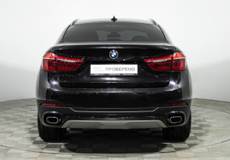 Подержанный автомобиль BMW X6 2016 года (11 фото)