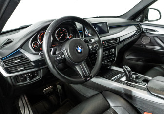 Подержанный автомобиль BMW X5 2014 года (10 фото)