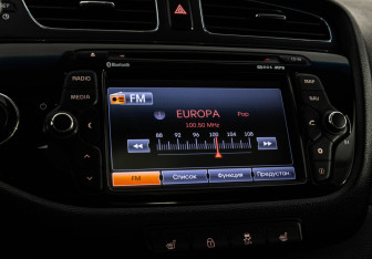 Подержанный автомобиль Kia Ceed Hatchback 2013 года (16 фото)