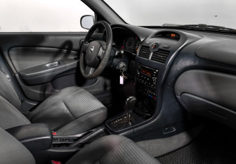 Подержанный автомобиль Nissan Almera Classic 2007 года (13 фото)