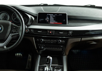 Подержанный автомобиль BMW X5 2016 года (14 фото)