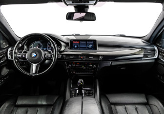 Подержанный автомобиль BMW X6 2015 года (13 фото)