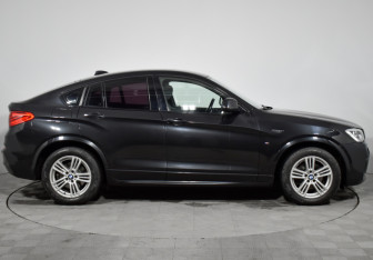 Подержанный автомобиль BMW X4 2015 года (4 фото)