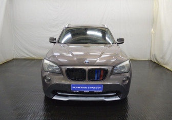 Подержанный автомобиль BMW X1 2012 года (2 фото)