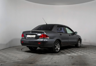 Подержанный автомобиль Mitsubishi Lancer Sedan 2006 года (5 фото)