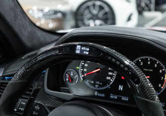 Подержанный автомобиль BMW X6 M 2017 года (24 фото)