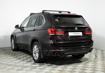 Подержанный автомобиль BMW X5 2015 года (7 фото)