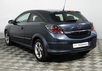 Подержанный автомобиль Opel Astra Hatchback 2010 года (7 фото)