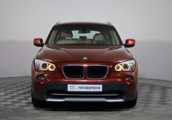 Подержанный автомобиль BMW X1 2011 года (2 фото)