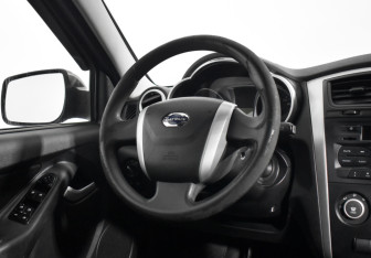 Подержанный автомобиль Datsun on-DO 2015 года (15 фото)