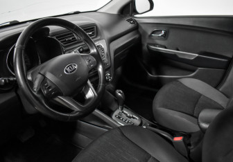 Подержанный автомобиль Kia Rio Sedan 2013 года (9 фото)