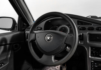 Подержанный автомобиль Daewoo Nexia Sedan 2012 года (15 фото)