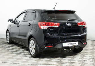 Подержанный автомобиль Kia Rio Hatchback 2015 года (7 фото)