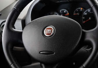 Подержанный автомобиль Fiat Doblo 2012 года (11 фото)