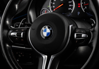 Подержанный автомобиль BMW X6 M 2017 года (14 фото)