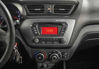 Подержанный автомобиль Kia Rio Hatchback 2014 года (15 фото)