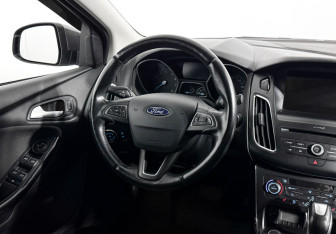 Подержанный автомобиль Ford Focus Sedan 2016 года (14 фото)
