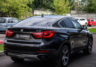 Подержанный автомобиль BMW X6 2016 года (5 фото)