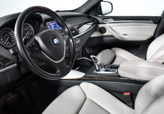 Подержанный автомобиль BMW X6 2011 года (9 фото)