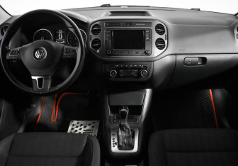 Подержанный автомобиль Volkswagen Tiguan 2015 года (13 фото)