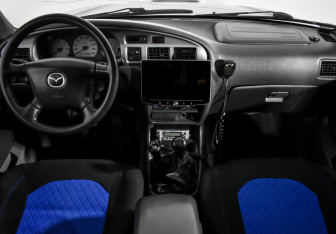 Подержанный автомобиль Mazda B-series 2005 года (15 фото)