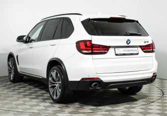 Подержанный автомобиль BMW X5 2015 года (7 фото)