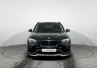 Подержанный автомобиль BMW X1 2014 года (2 фото)