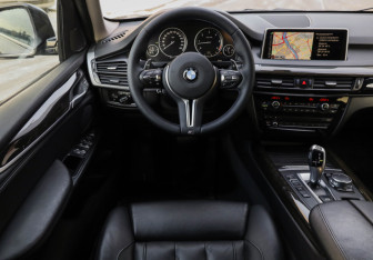 Подержанный автомобиль BMW X5 2016 года (13 фото)