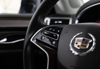 Подержанный автомобиль Cadillac SRX 2013 года (25 фото)
