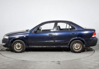 Подержанный автомобиль Nissan Almera Classic 2010 года (8 фото)
