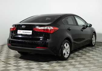 Подержанный автомобиль Kia Cerato Sedan 2013 года (5 фото)