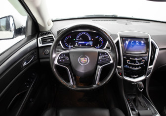 Подержанный автомобиль Cadillac SRX 2013 года (10 фото)