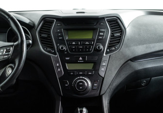 Подержанный автомобиль Hyundai Santa Fe 2014 года (14 фото)