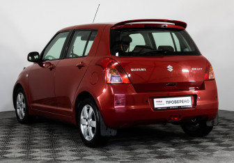 Подержанный автомобиль Suzuki Swift Hatchback 2010 года (7 фото)
