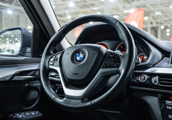 Подержанный автомобиль BMW X6 2016 года (18 фото)