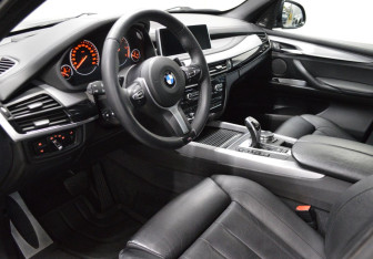 Подержанный автомобиль BMW X5 2015 года (10 фото)