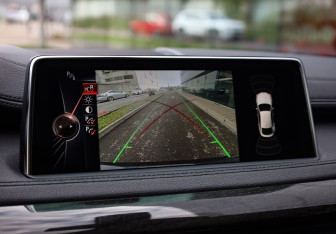 Подержанный автомобиль BMW X6 2016 года (22 фото)