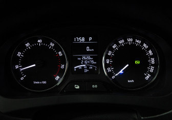 Подержанный автомобиль Skoda Rapid Liftback 2014 года (12 фото)
