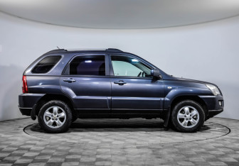 Подержанный автомобиль Kia Sportage 2010 года (4 фото)