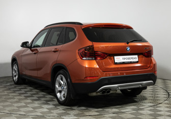 Подержанный автомобиль BMW X1 2013 года (7 фото)
